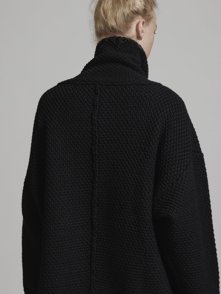 
                  
                    HIGH NECK OVER KNIT BLOUSON
                  
                