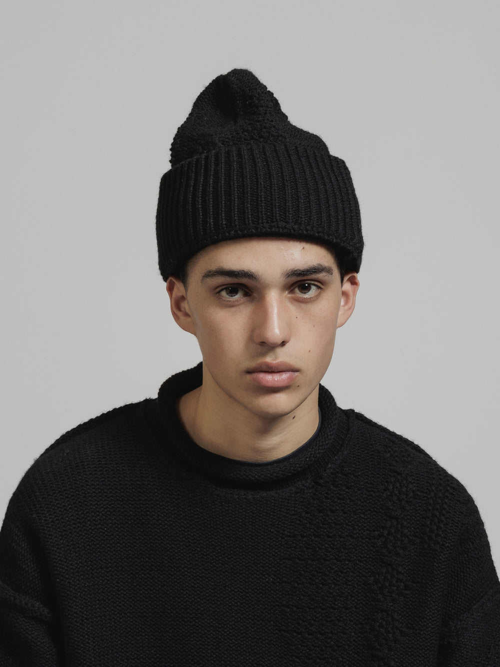 CABLE KNIT BEANIE