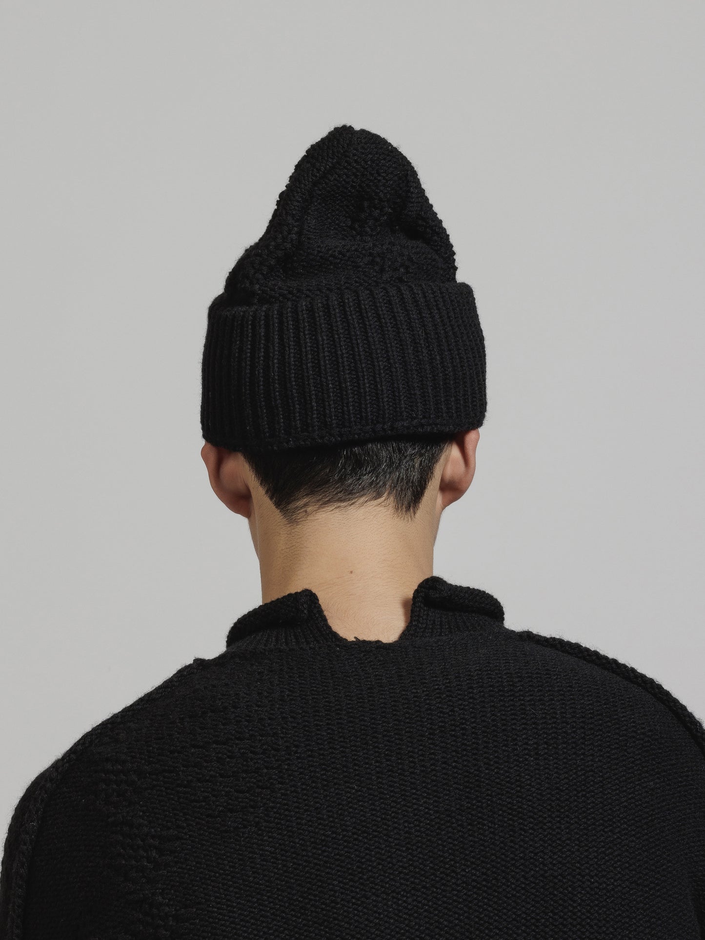 
                  
                    CABLE KNIT BEANIE
                  
                