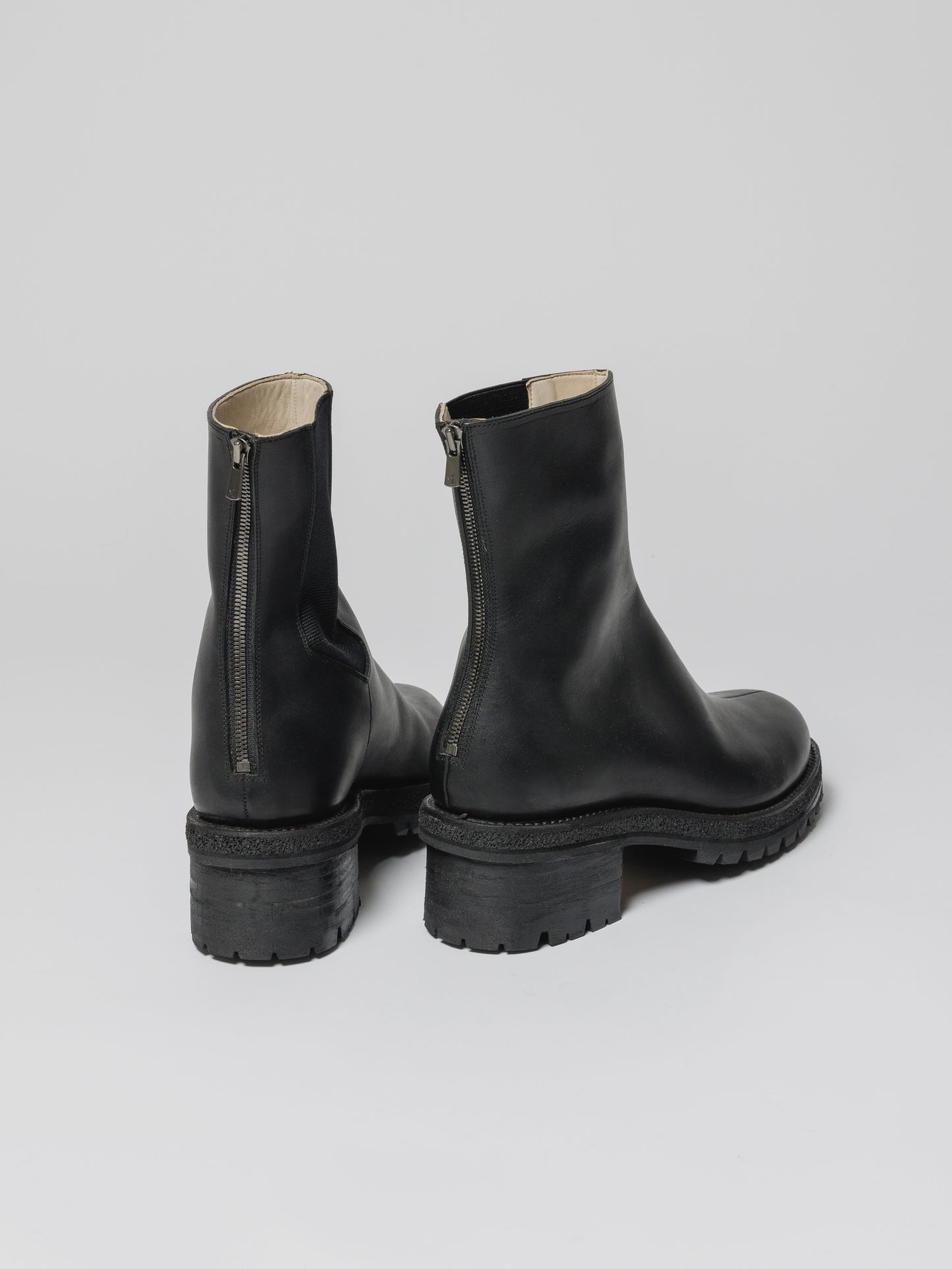 
                  
                    BACK ZIP-UP BOOTS
                  
                