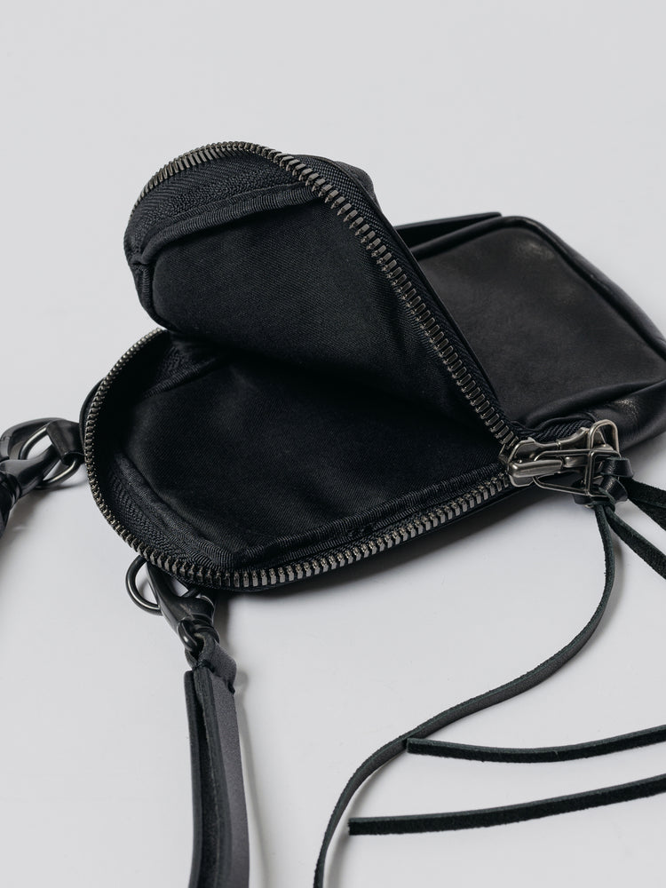 
                  
                    LEATHER NECK POUCH
                  
                